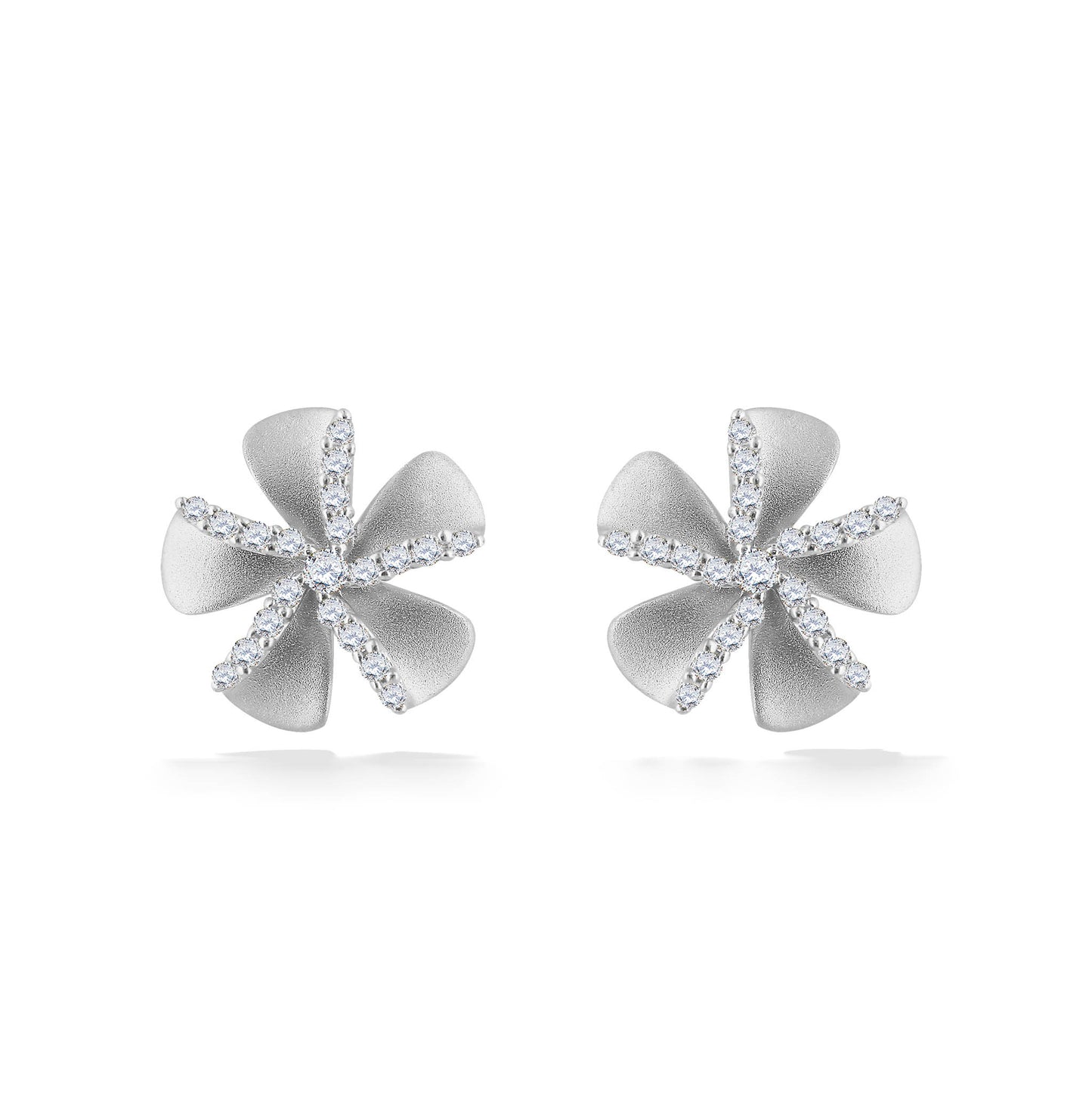 Elegant white gold plumeria stud earrings with brilliant diamond-lined petals in bloom. Item No. 44686
