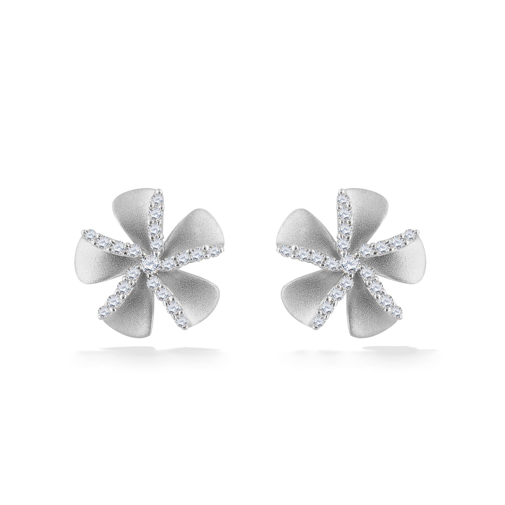Elegant white gold plumeria stud earrings with brilliant diamond-lined petals in bloom. Item No. 44686
