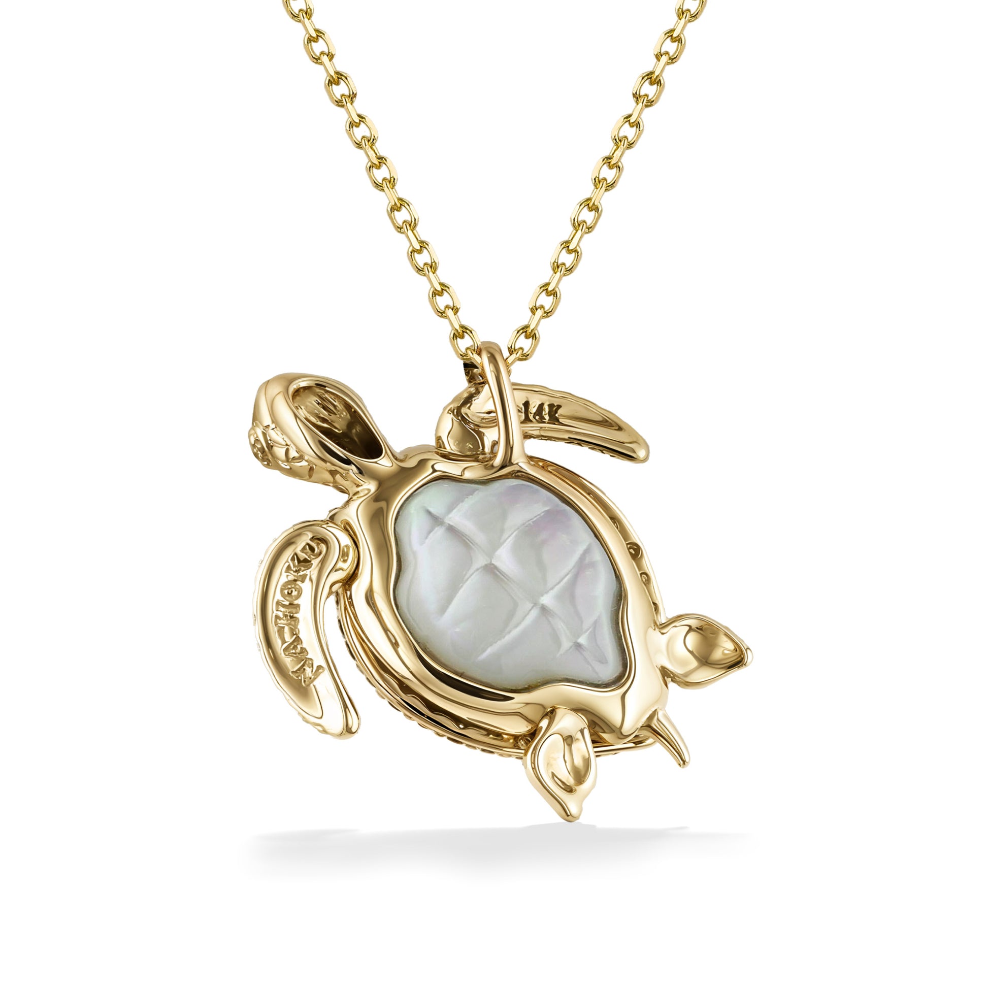 Bottom of turtle pendant with carved white mother of pearl belly set in 14k yellow gold & trademark stamps. Item No. 44543