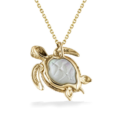 Bottom of turtle pendant with carved white mother of pearl belly set in 14k yellow gold & trademark stamps. Item No. 44543
