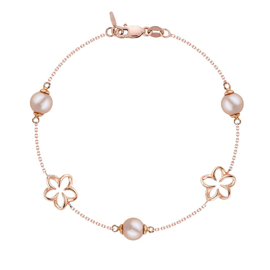 Delicate 14k rose gold chain bracelet featuring pink pearls and plumeria flower accents. Item No. 44907