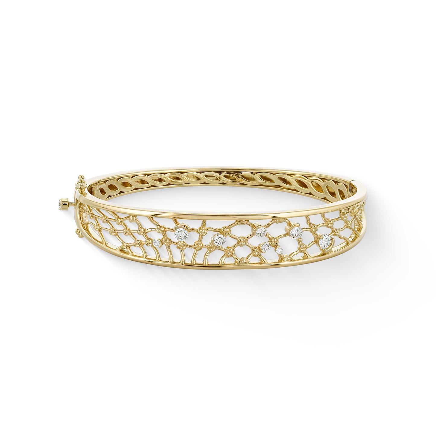 Hukilau net inspired hinged bangle in 14k yellow gold with diamond accents on the net & button of box clasp. Item No. 44943