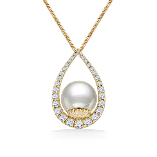 Gold teardrop-shaped pendant showcasing a luminous 11mm white south sea pearl, framed by sparkling diamonds. Item No. 45109