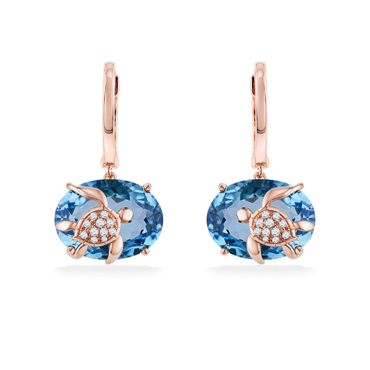 Warm rose gold hoop earrings designed with luminous oval blue topaz, highlighted by diamond-accented turtles. Item No. 773830