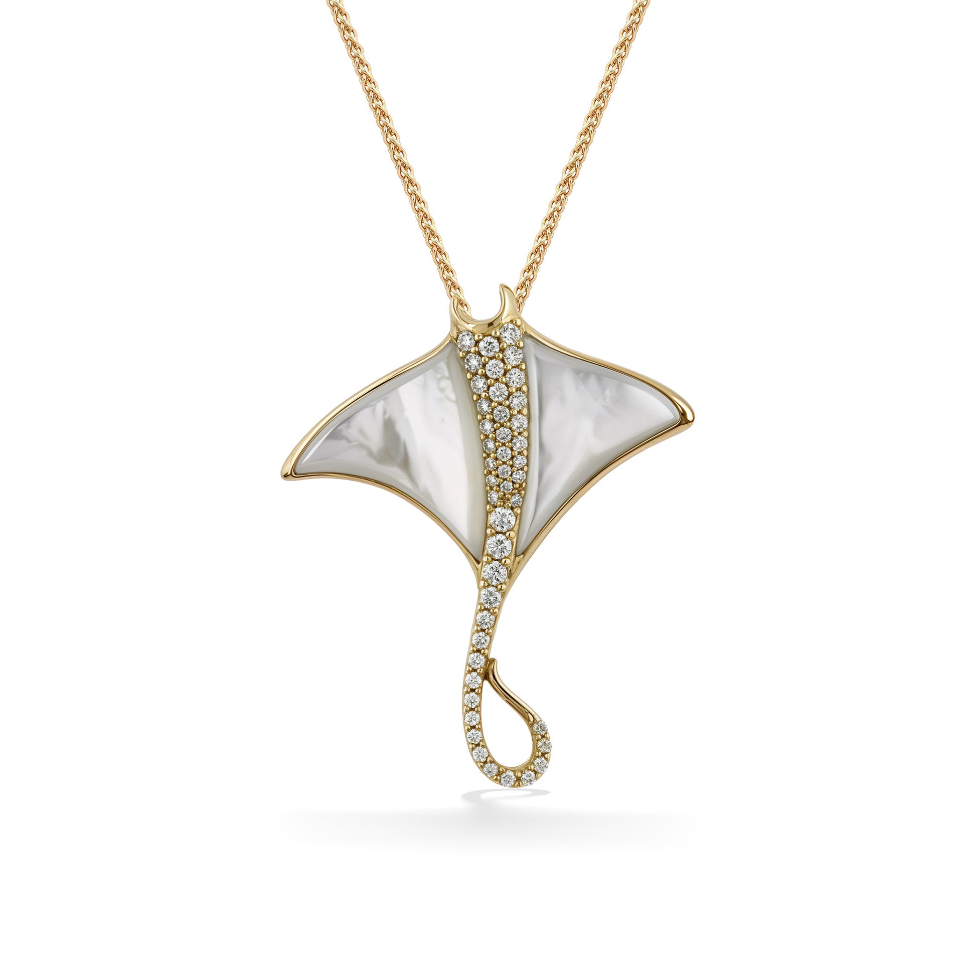 Yellow gold manta ray pendant with diamond accented center pavé-set diamonds and white mother of pearl wings. Item No. 773901
