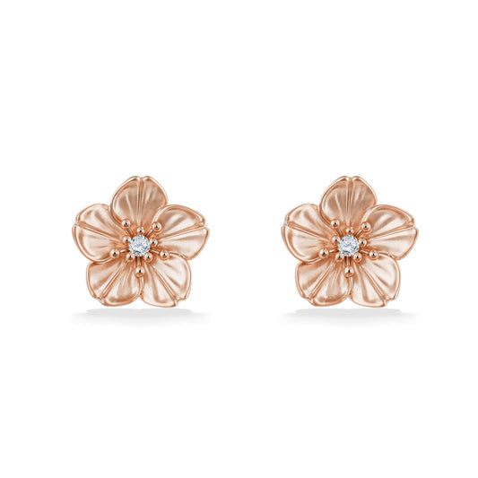 Rose gold cherry blossom earrings featuring a warm blush finish and a sparkling diamond focal point. Item No. 45182