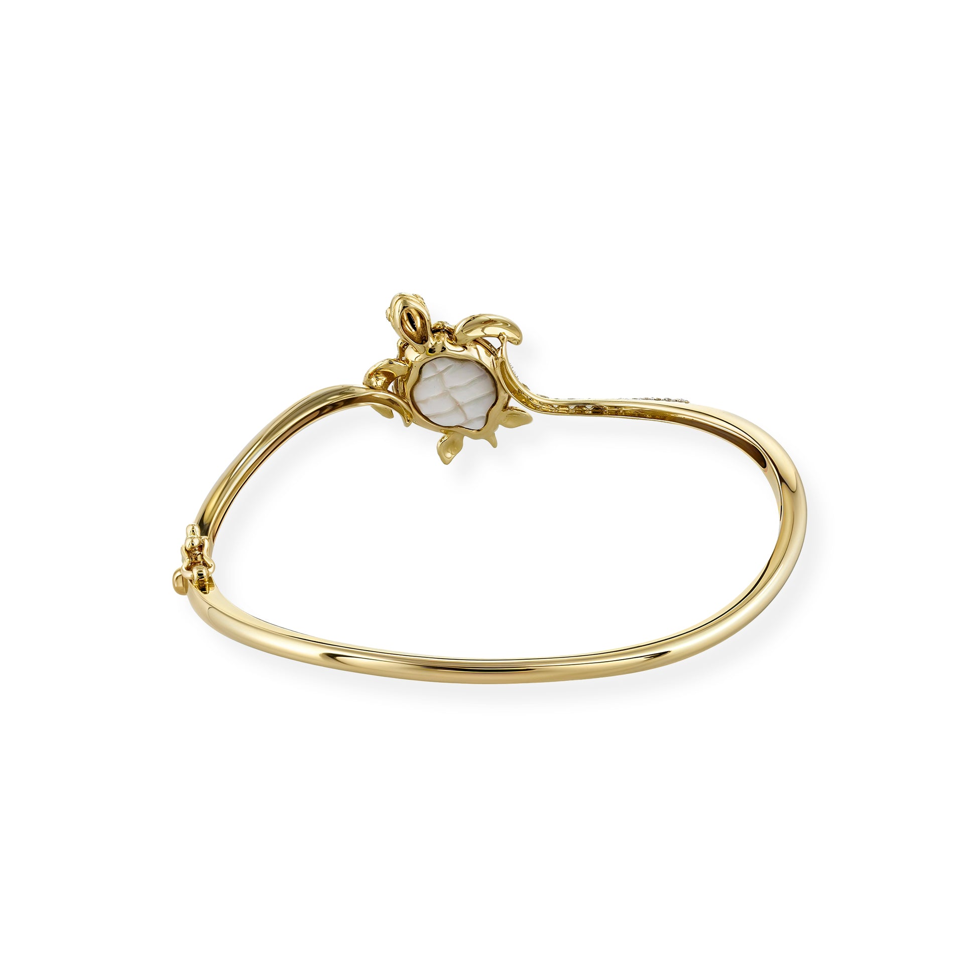 Yellow gold hinged bangle with a turtle centerpiece detailed with a white mother of pearl inlay belly. Item No. 45186