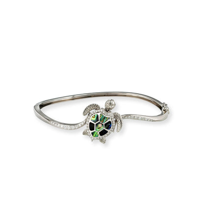 White gold hinged bangle featuring a detailed turtle centerpiece with abalone shell & pavé diamonds. Item No. 45187