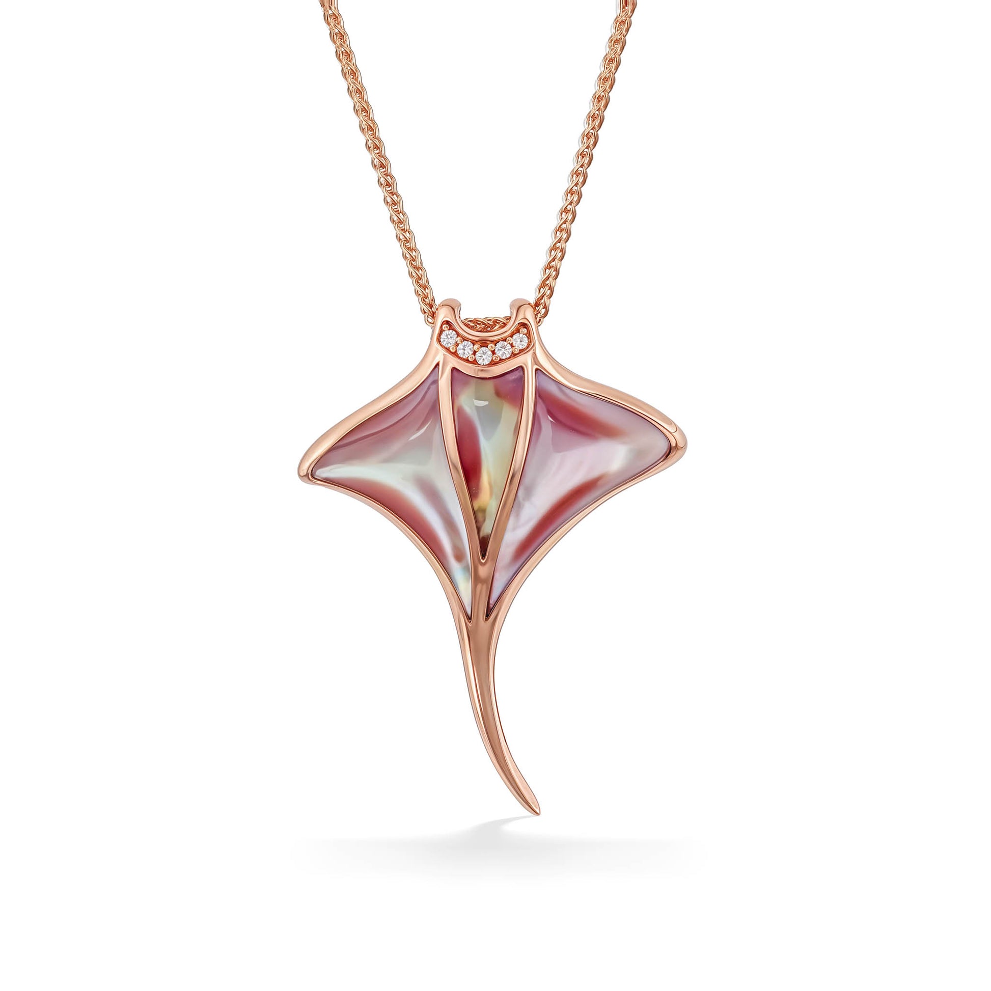 Pink mother of pearl manta ray pendant set in 14k rose gold with a diamond-lined mouth. Item No. 774022