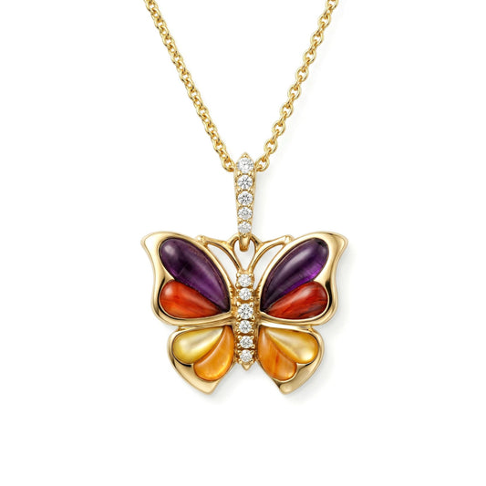Yellow gold butterfly pendant with spiny oyster shell inlay and diamond accents on the body and bail. Item No. 774048