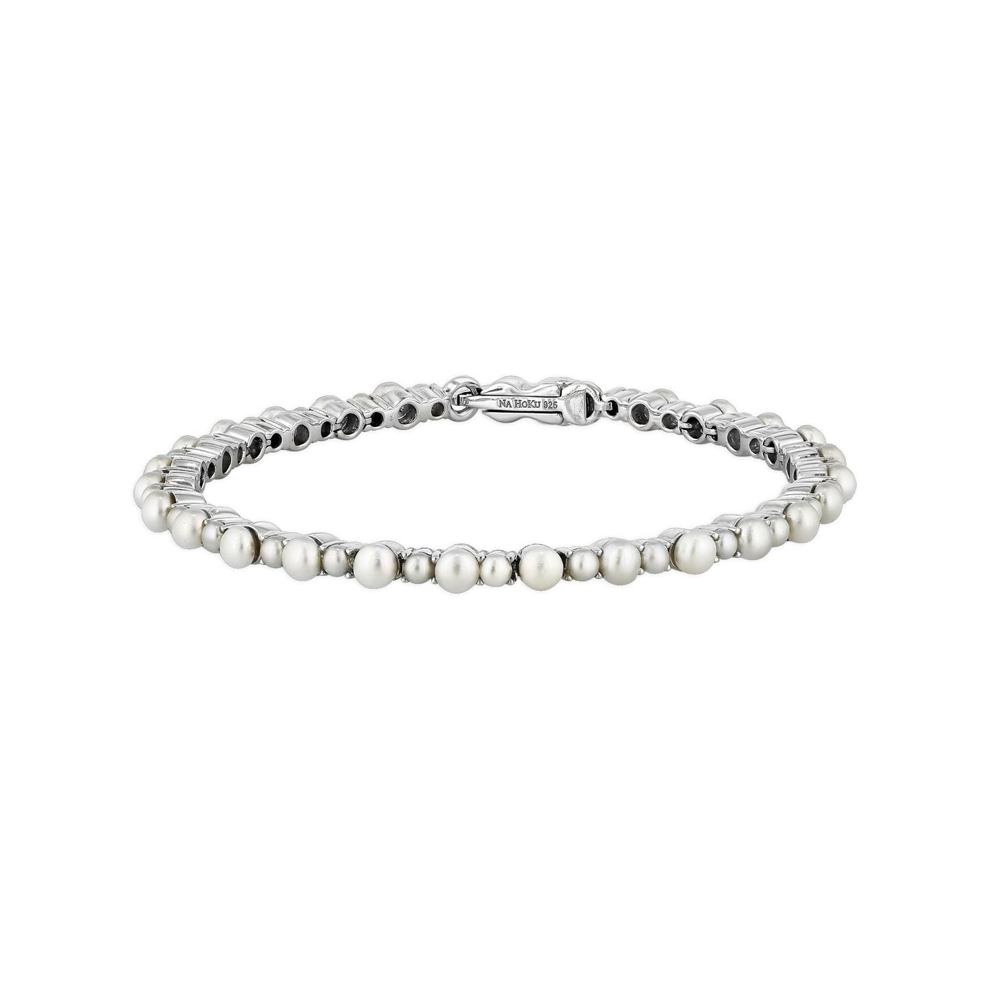 Pearl tennis bracelet with round white freshwater pearls set in a polished sterling silver link design. Item No. 774057