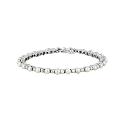 Pearl tennis bracelet with round white freshwater pearls set in a polished sterling silver link design. Item No. 774057