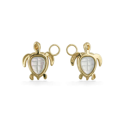 Reversed view highlights carved white mother of pearl shell backs framed in polished gold. Item No. 45249