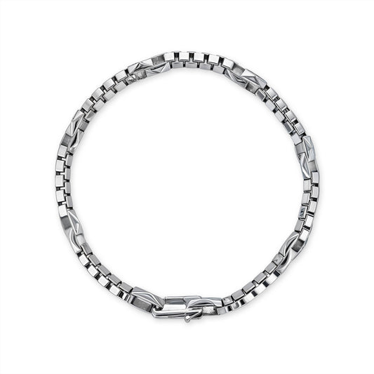 Sterlin silver men’s bracelet with a polished & brushed geometric link design, secured by a sleek clasp. Item No. 774107