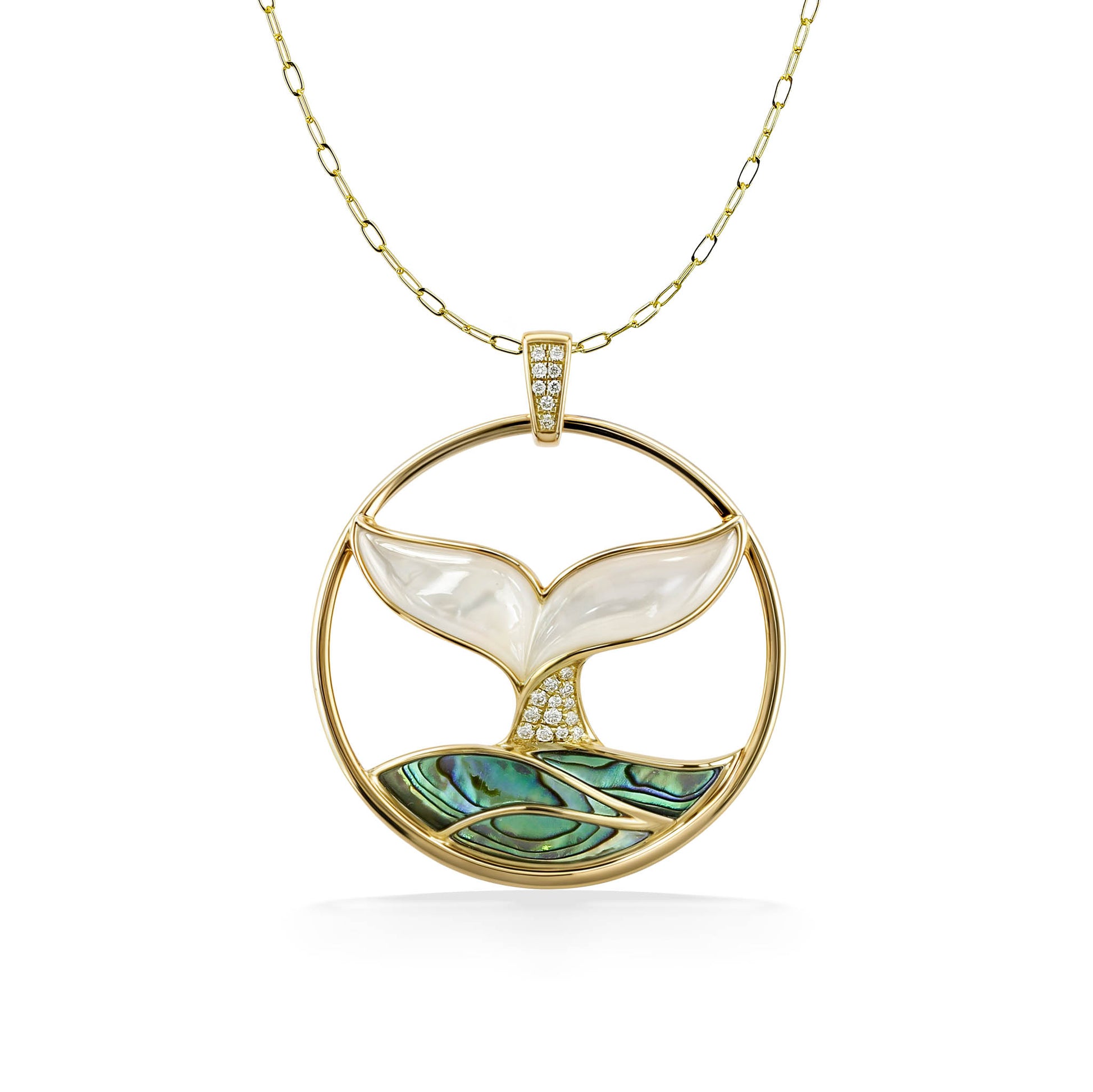 Whale tail pendant in a 14k gold circle featuring white mother of pearl & abalone inlay with diamond accents. Item No. 774203
