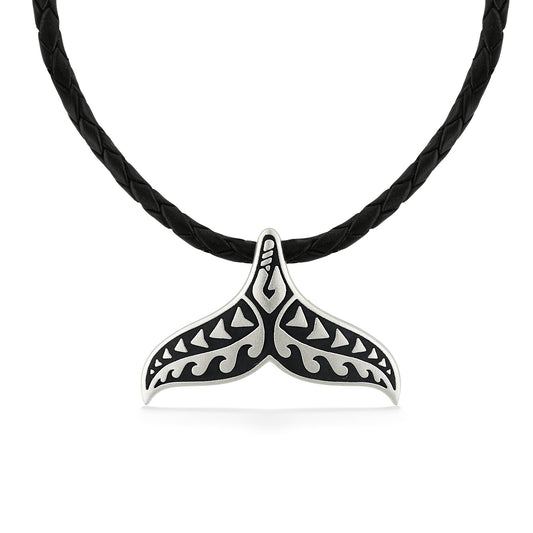 Tattoo Whale Tail pendant in sterling silver with black enamel pattern, hung on a black braided leather cord. Item No. 45267
