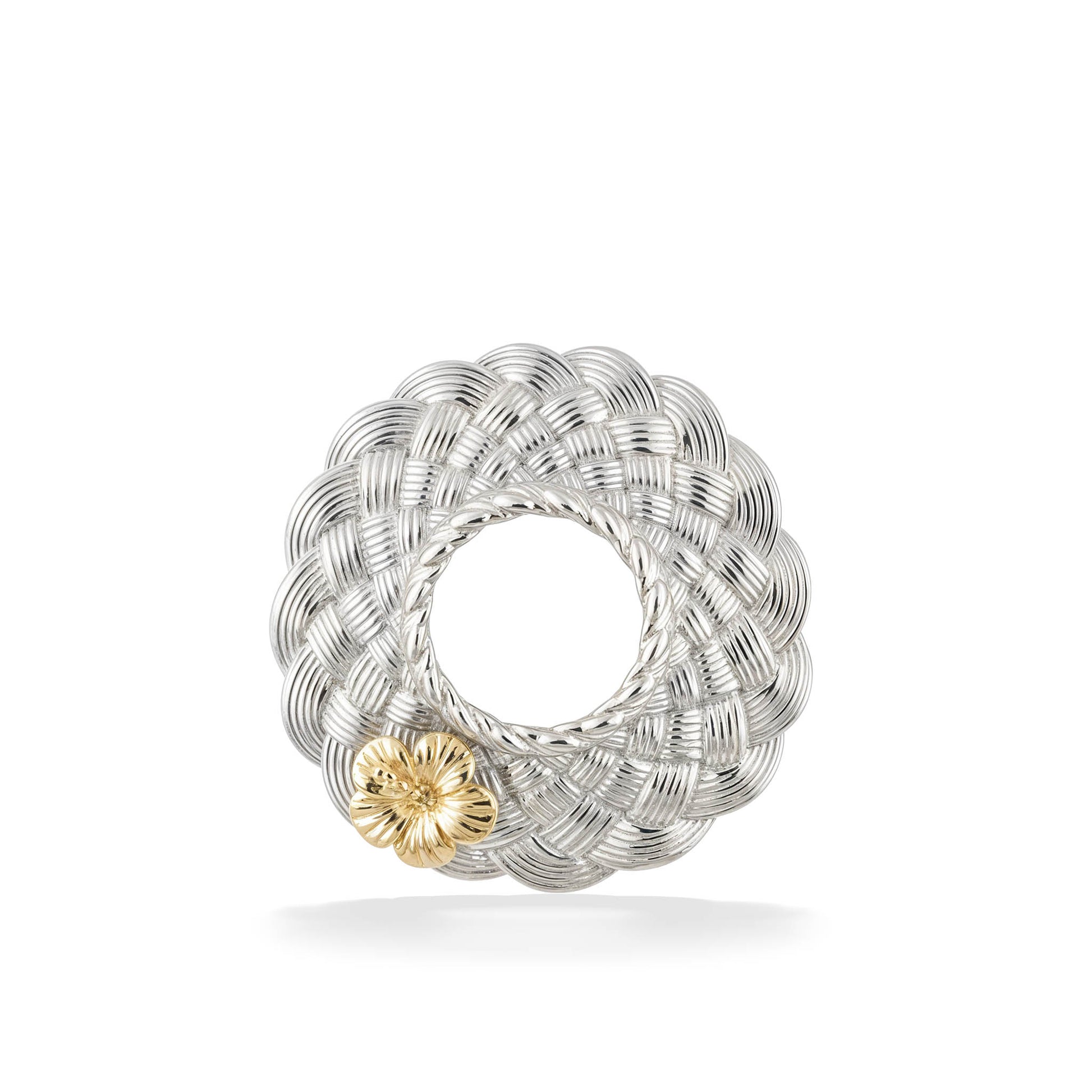 Textured sterling silver circular pendant designed with a woven pattern and 14k gold hibiscus accent. Item No. 45263