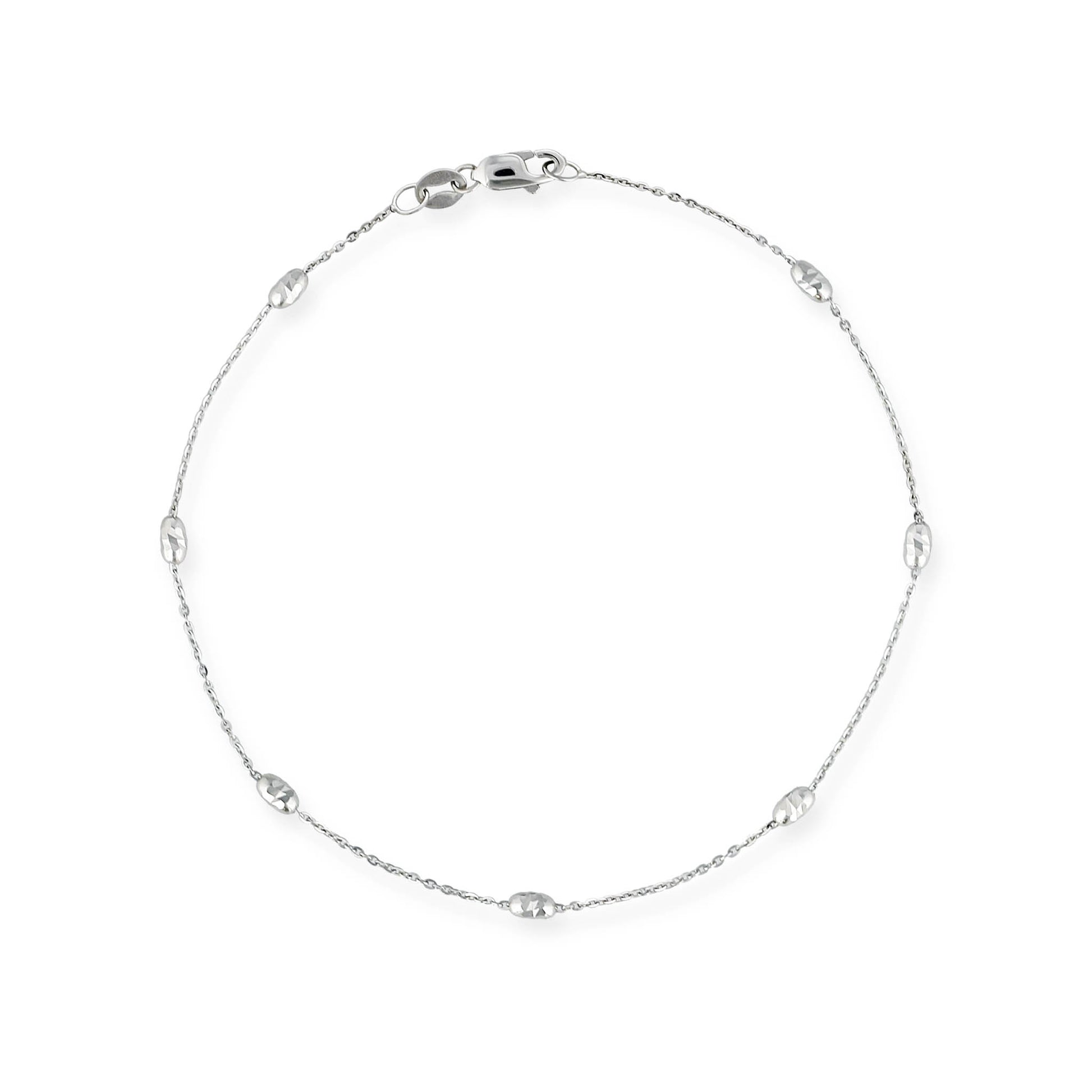 Delicate bracelet featuring polished oval beads spaced along a fine 14k white gold chain. Item No. 774223