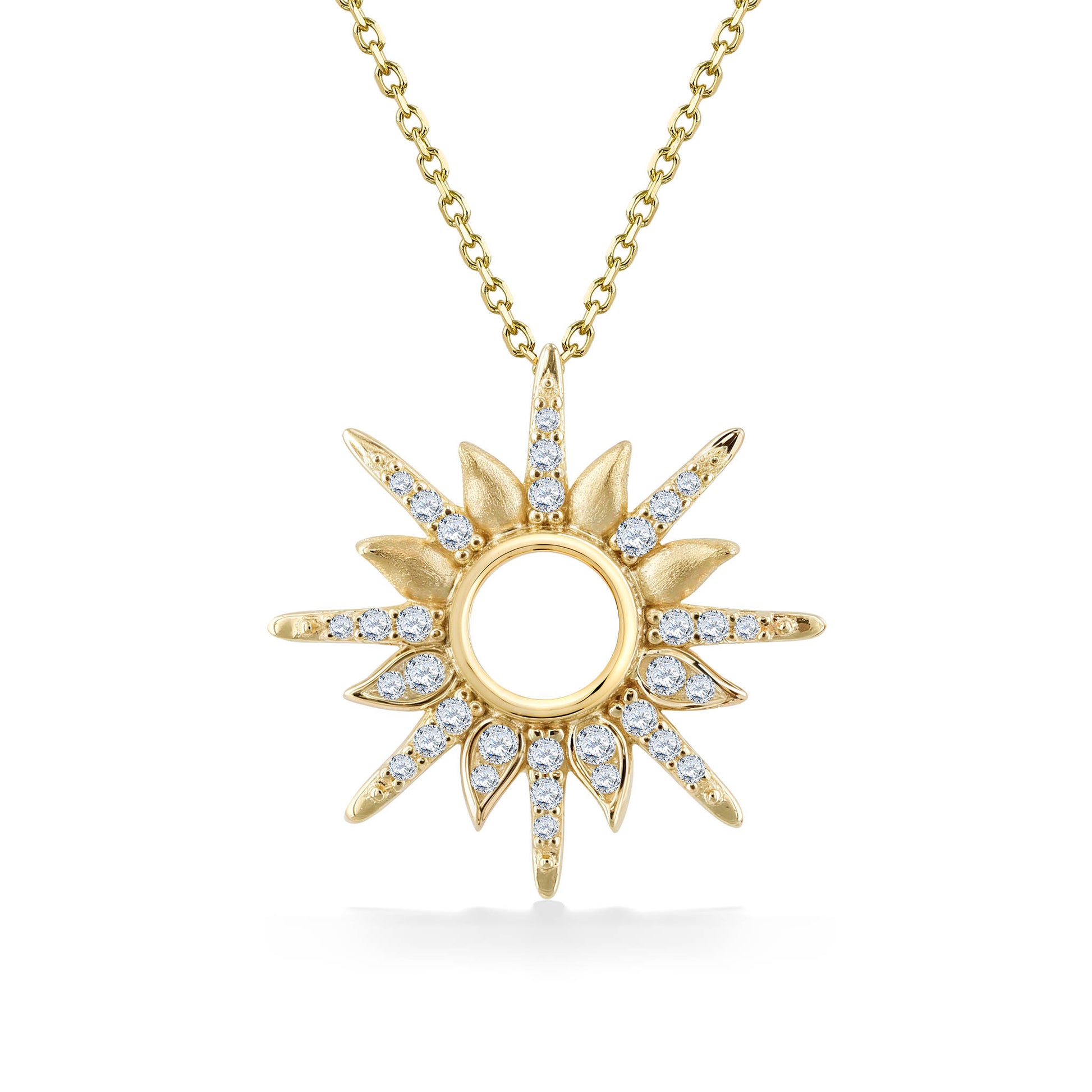 14k yellow gold sunburst pendant featuring alternating polished & diamond-set rays encircling an open center. Item No. 45280