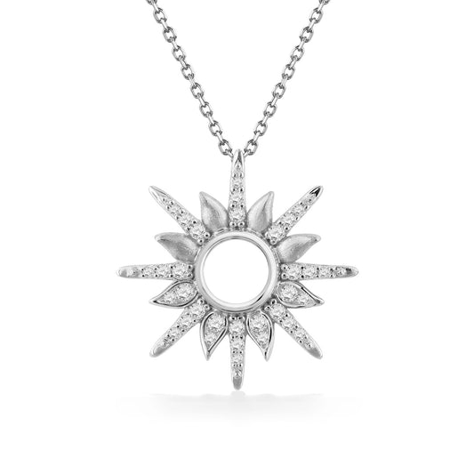 White gold diamond sunburst pendant with an open circular center & alternating polished & pavé diamond rays. Item No. 45284
