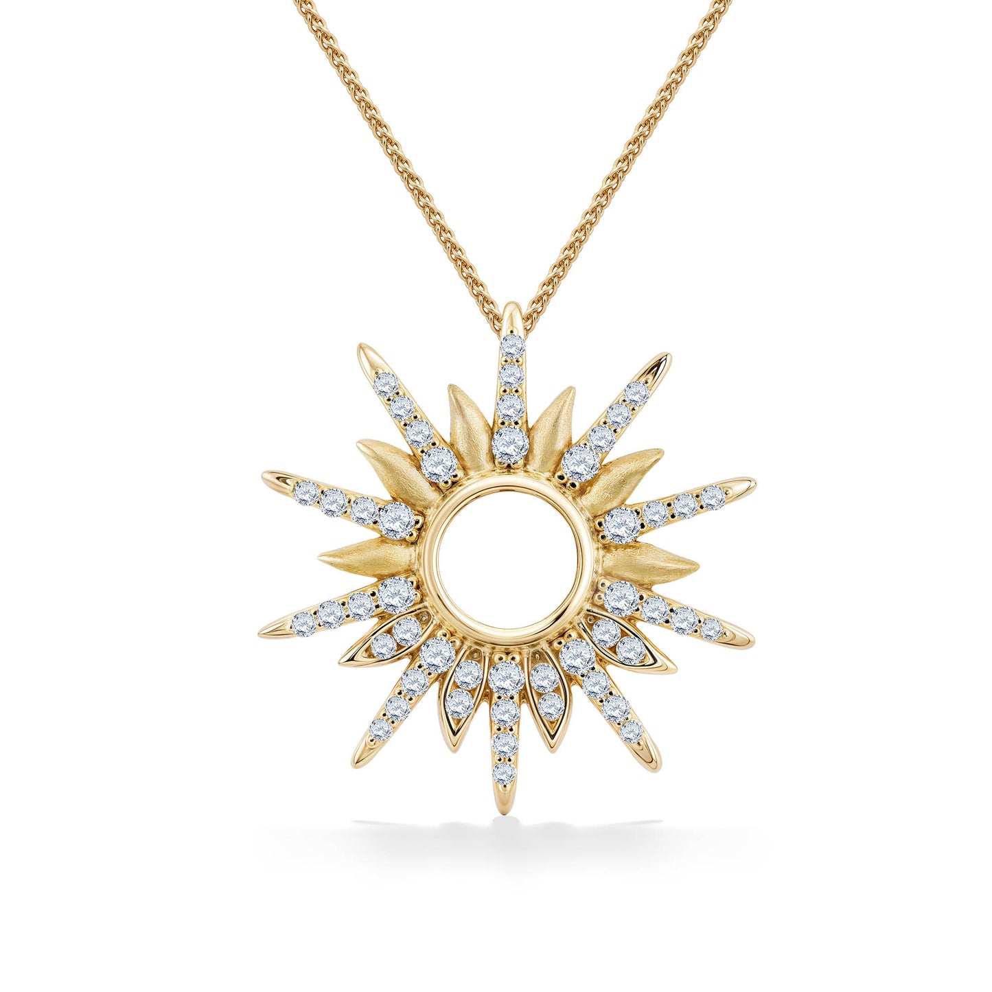 14k yellow gold sunburst pendant featuring alternating polished & diamond-set rays encircling an open center. Item No. 45280