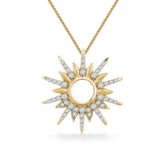 14k yellow gold sunburst pendant featuring alternating polished & diamond-set rays encircling an open center. Item No. 45280