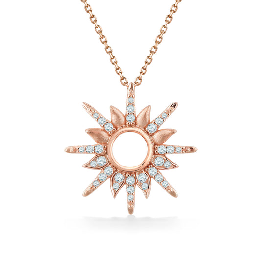Rose gold diamond sunburst pendant with white diamonds radiating from circular open center on matching chain. Item No. 45285
