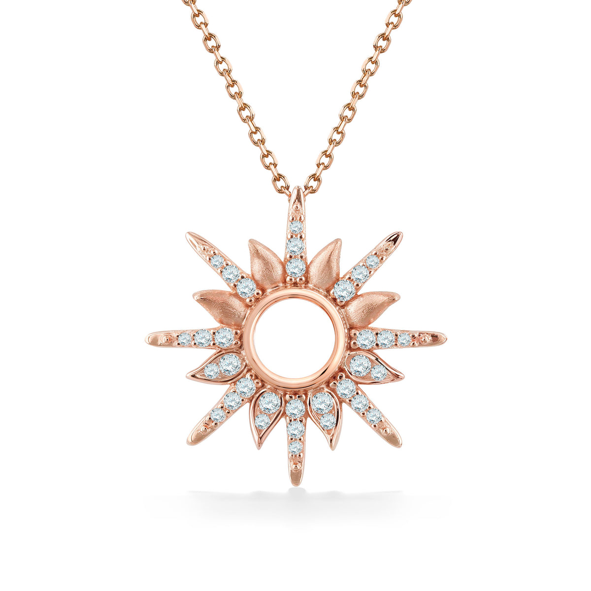 Rose gold diamond sunburst pendant with white diamonds radiating from circular open center on matching chain. Item No. 45285
