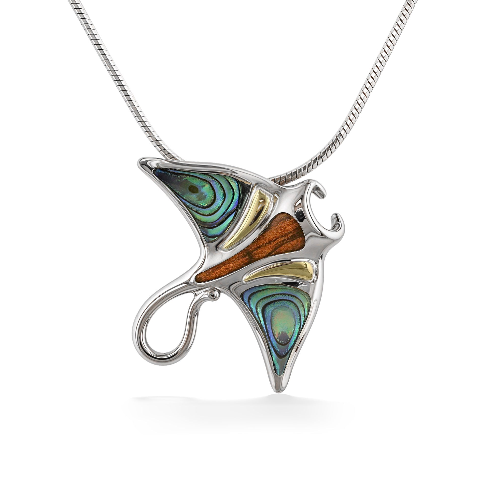 A manta ray pendant crafted from sterling silver with abalone shell, koa wood, and 18k gold inlays. Item No. 45290