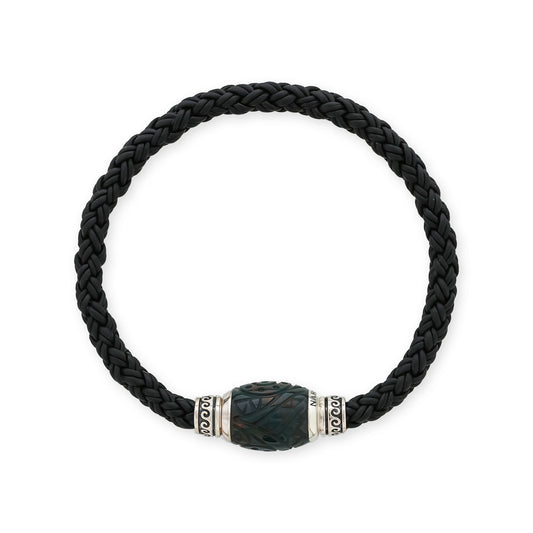 Men’s bracelet made of black braided leather with a carved bloodstone center framed by sterling silver detail. Item No. 45293