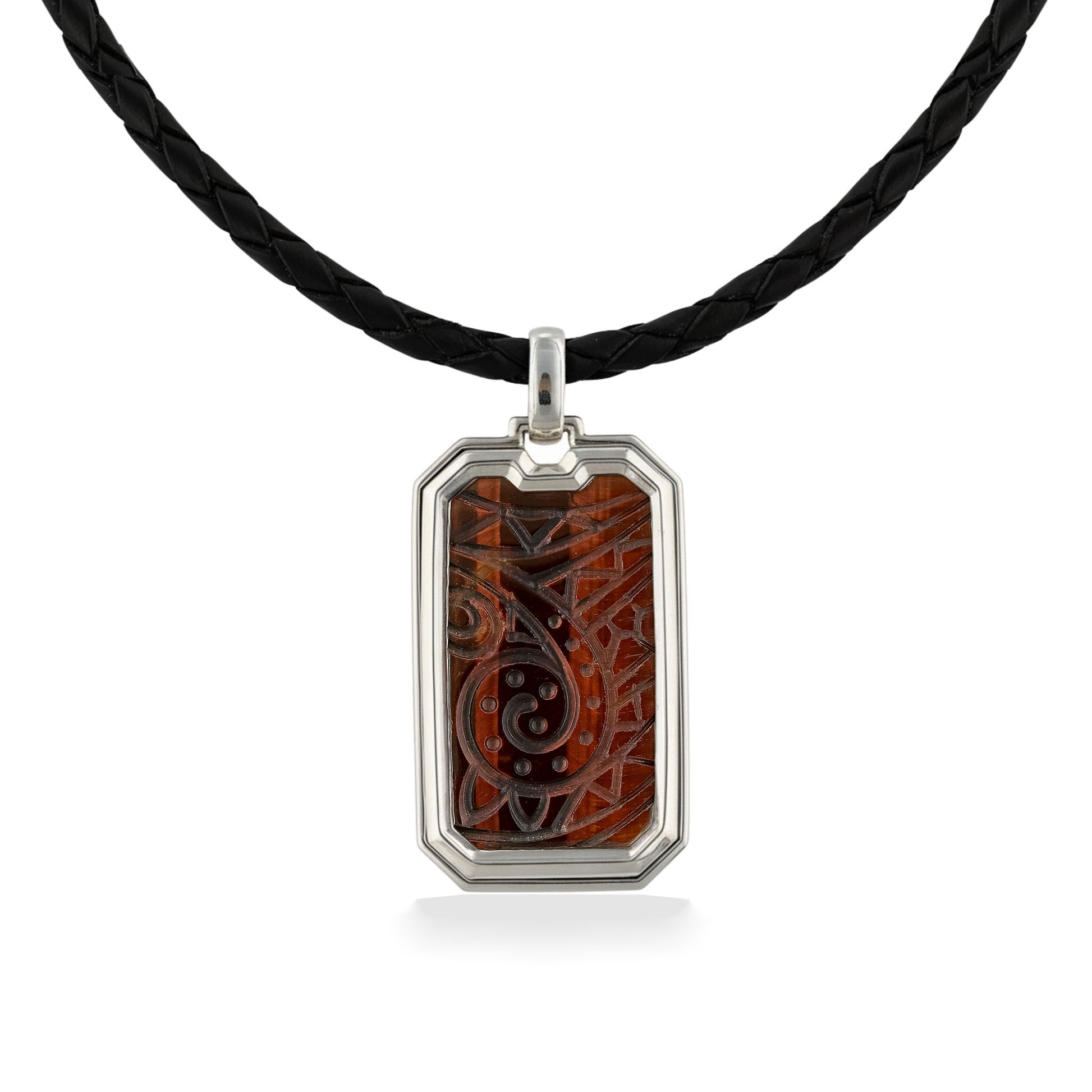 Rectangular carved pendant with brown stone inlay suspended from a black braided cord. Item No. 45297