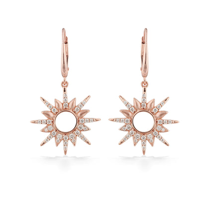 Seen head-on, sun-inspired drop earrings highlight layered rays, soft matte textures & sparkling diamonds. Item No. 45310