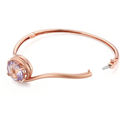 Side view of the 14k rose gold plumeria bangle & amethyst center, revealing clasp with 14k white gold tongue. Item No. 774325