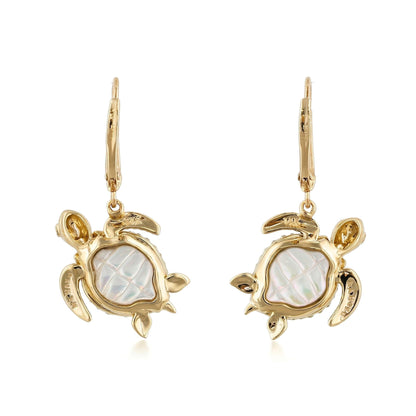Back side of gold sea turtle lever back earrings showcasing a carved white mother of pearl inlay belly. Item No. 45359
