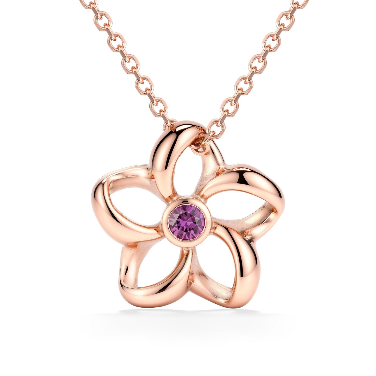 Floral open plumeria pendant made in 14K rose gold with a bezel-set pink sapphire center accent. Item No. 45372