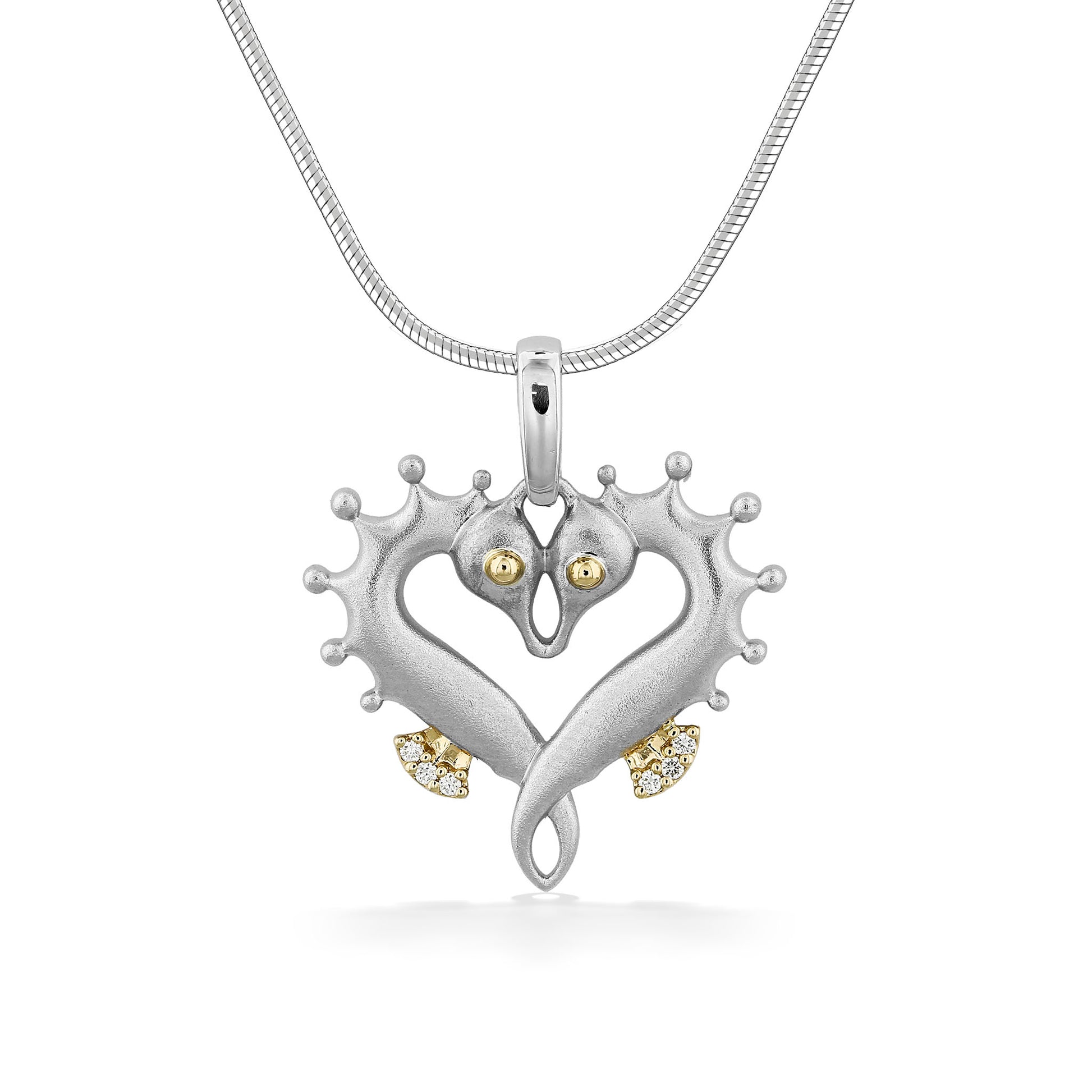 Sterling silver and 14K gold seahorse heart pendant with diamond accents and chain. Item No. 45375