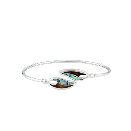 Sterling silver and 18K gold maile leaf bypass bangle with abalone and koa wood inlay. Item No. 45386