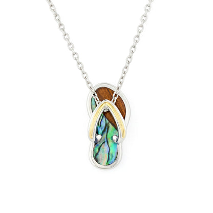 A slipper shaped pendant in sterling silver and gold strap with koa wood and abalone inlay on a silver chain. Item No. 45404
