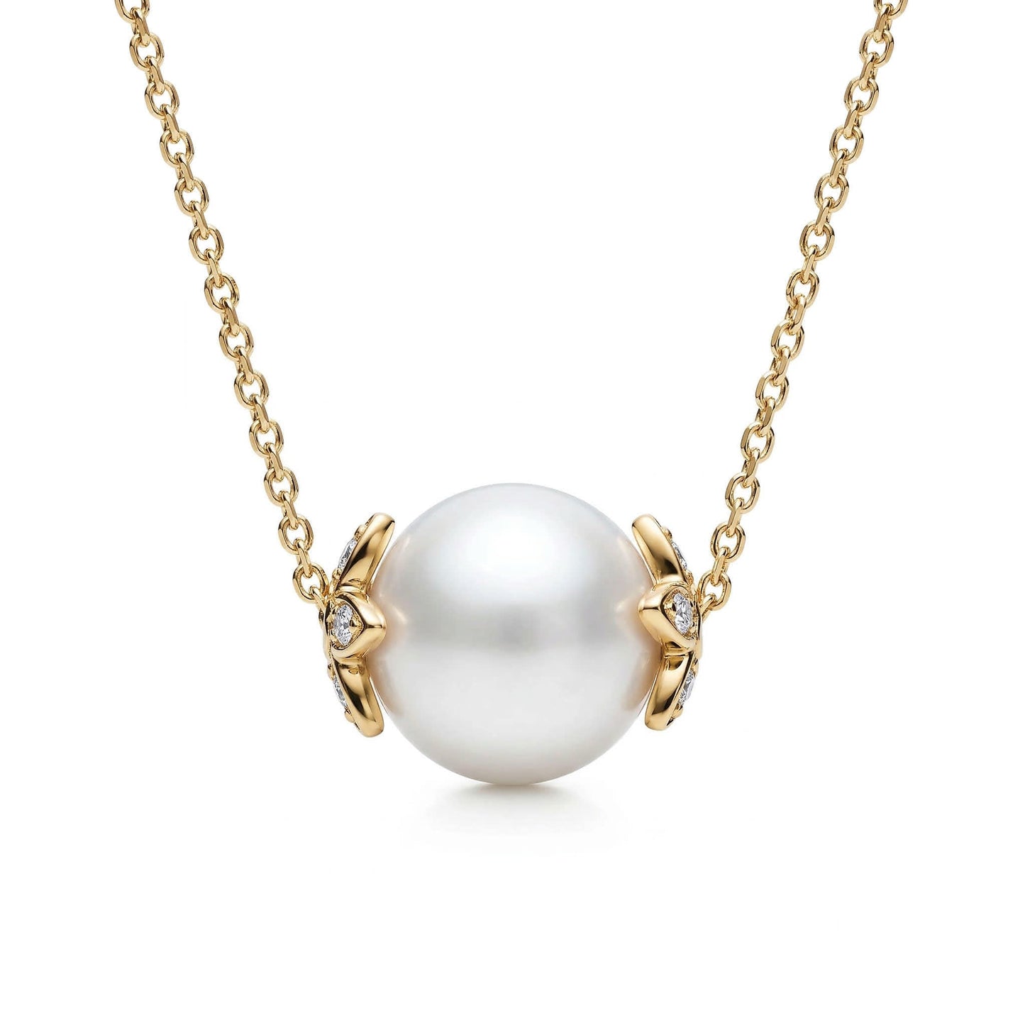 Round white akoya pearl slider necklace with 14k yellow gold flower endcaps, accented with diamonds. Item No. 45412