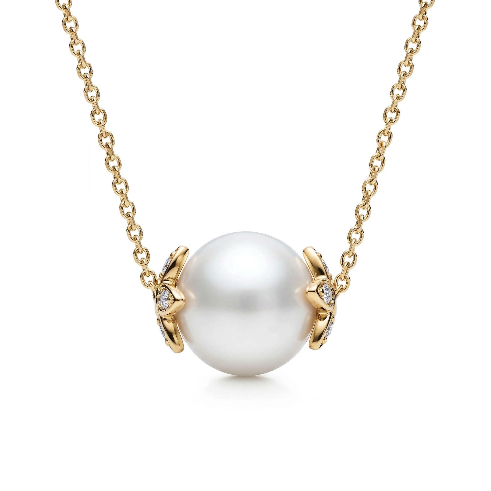Round white akoya pearl slider necklace with 14k yellow gold flower endcaps, accented with diamonds. Item No. 45412