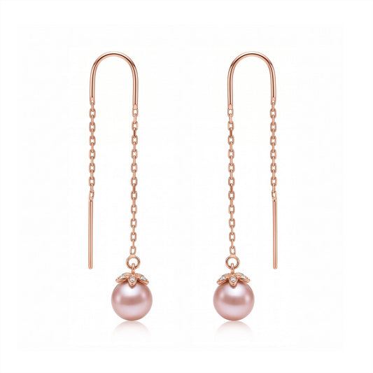 14k Rose gold threader earrings with pink freshwater pearl and diamond set flower end caps. Item No. 45425