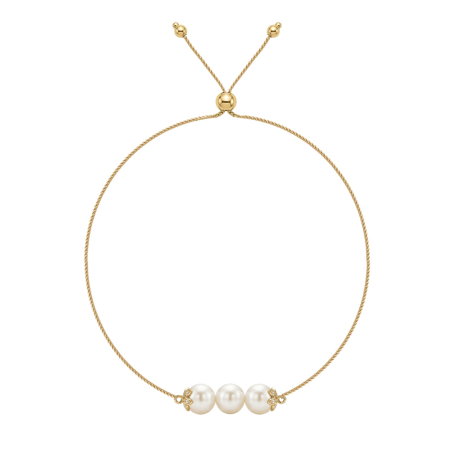 14K yellow gold flower bolo bracelet with three white Akoya pearls and diamond accents. Item No. 45446