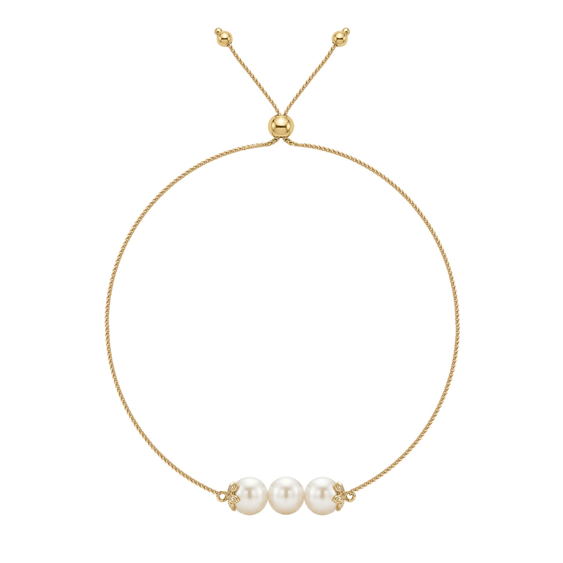 14K yellow gold flower bolo bracelet with three white Akoya pearls and diamond accents. Item No. 45446