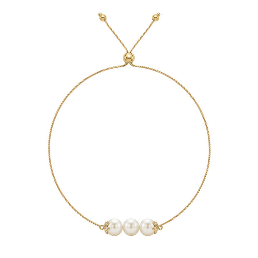 14K yellow gold flower bolo bracelet with three white Akoya pearls and diamond accents. Item No. 45446