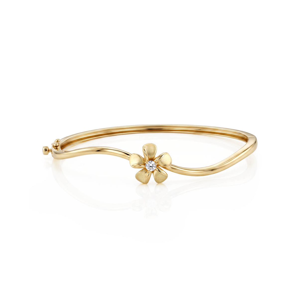 14k yellow gold bangle with plumeria flower and diamond center. Item No. 45461