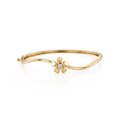 14k yellow gold bangle with plumeria flower and diamond center. Item No. 45461