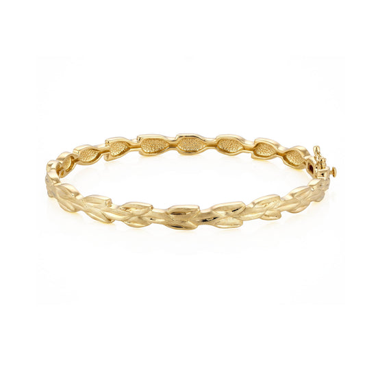 14K yellow gold bangle designed continuous of a maile leaf. Item No. 45464