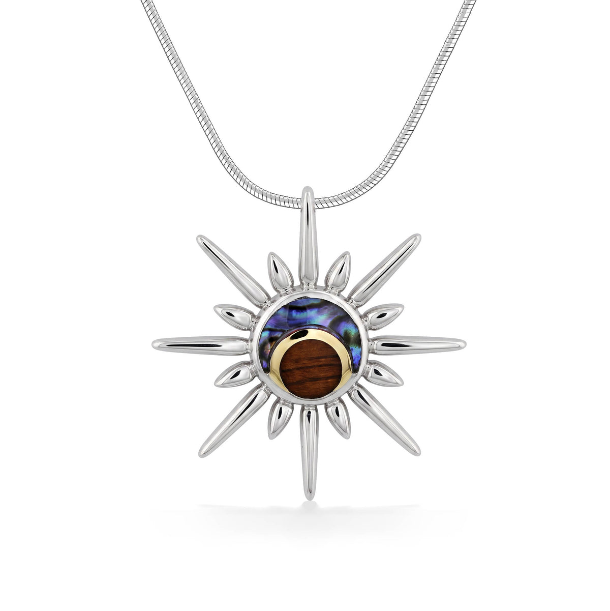 Sterling silver sun shaped pendant design with 18k gold, abalone, and koa wood inside. Item No. 45501