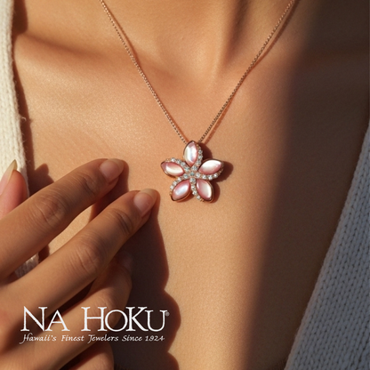 Close up of model wearing rose gold Plumeria pendant with pink mother of pearl petals and diamonds. Item No. 43730