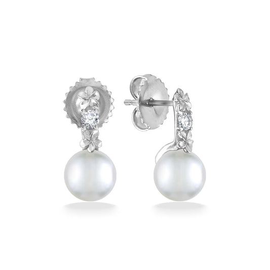 White gold drop earrings with Akoya pearls and diamond-set plumeria accents for a crisp, modern look. Item No. 44375